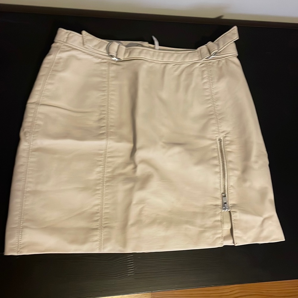 Faux leather mini skirt with slit